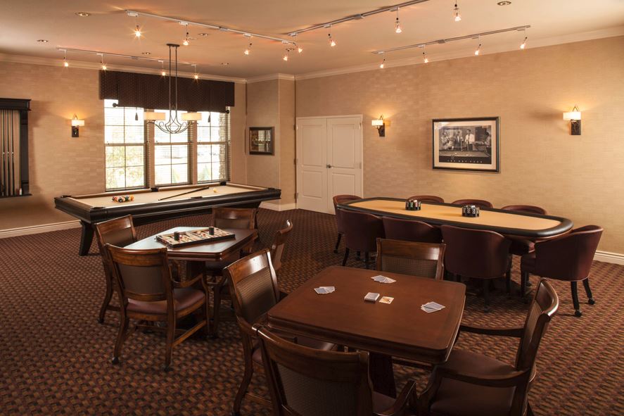 The game room at Oakmont of Capriana Assisted Living offers many options for hobbies.