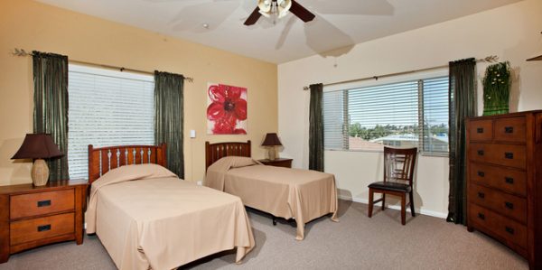 Plaza Village Senior Living 6 - master shared suite.jpg