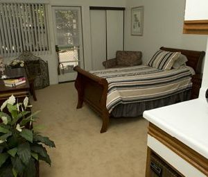 Whitten Heights Assisted Living and Memory Care 6 - apartment bedroom.JPG