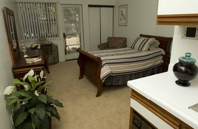 Whitten Heights Assisted Living and Memory Care 6 - apartment bedroom.JPG