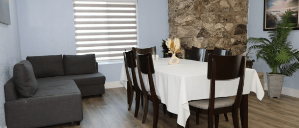 lucy-dinkie-home-care-llc-dinning-table-sofa.png